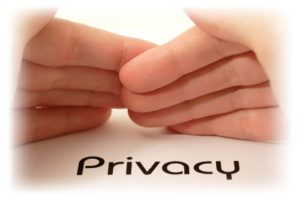The word privacy being shielded by two hands
